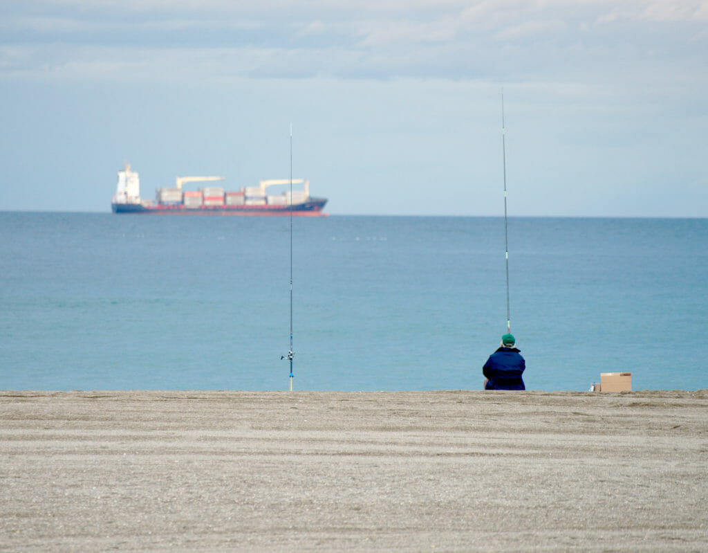 pecheur à la plage de Malagueta