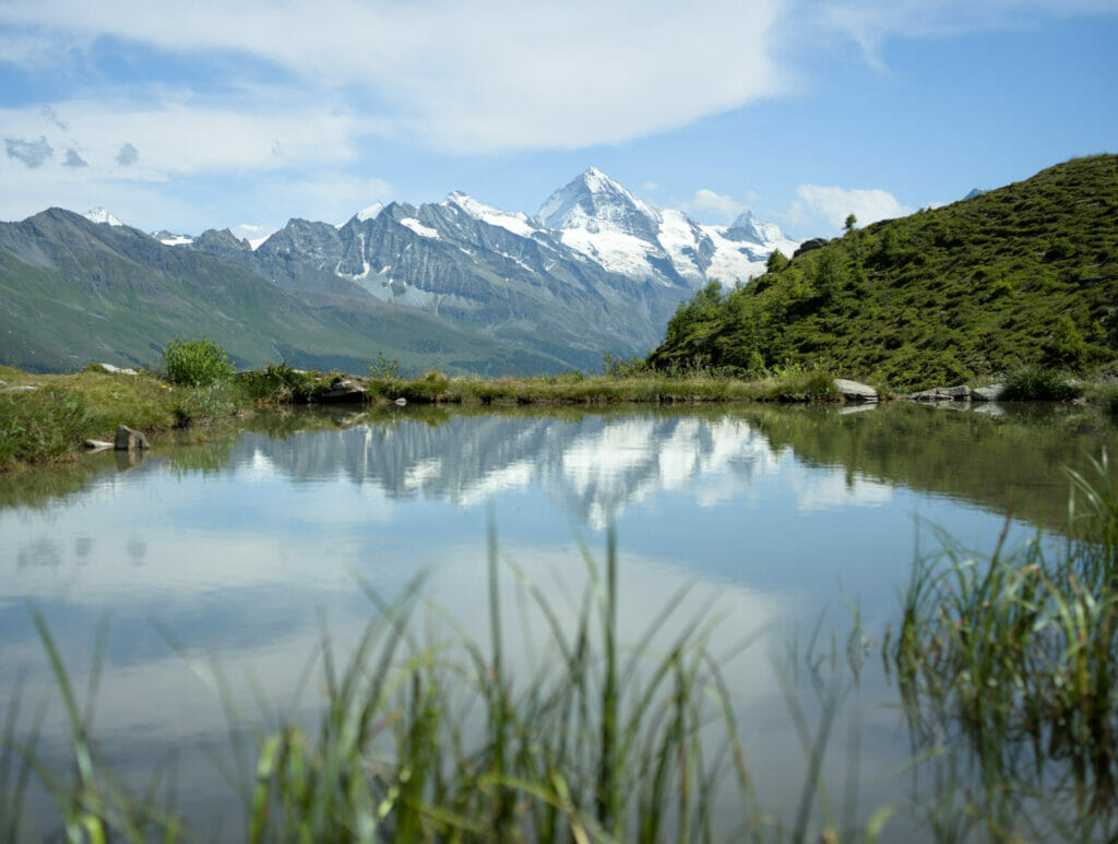 reflection of the Dent Blanche and the Matterhorn in the gully