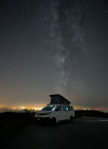 our van under the milky way