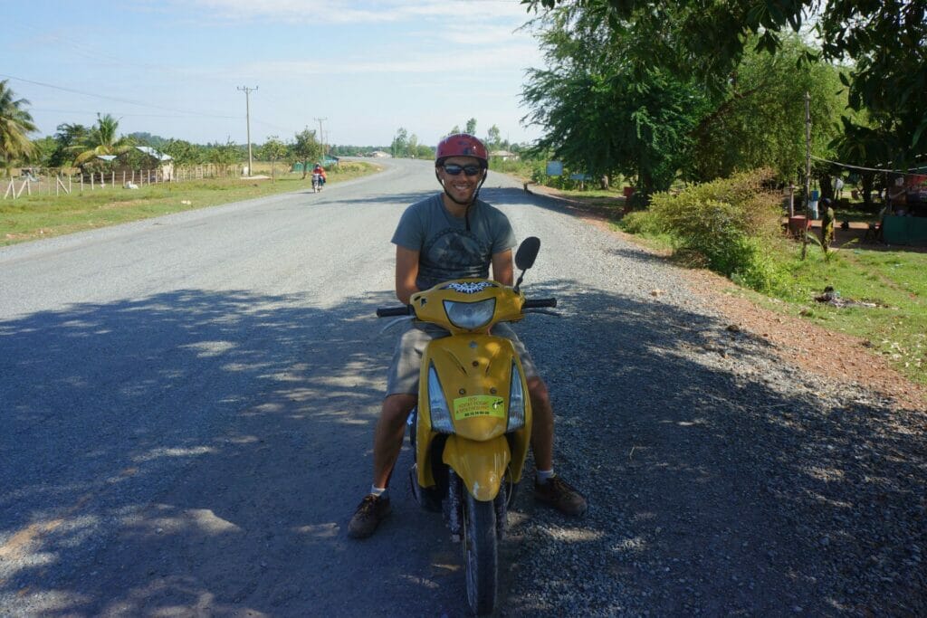Benoit on a motorbike in Kampot