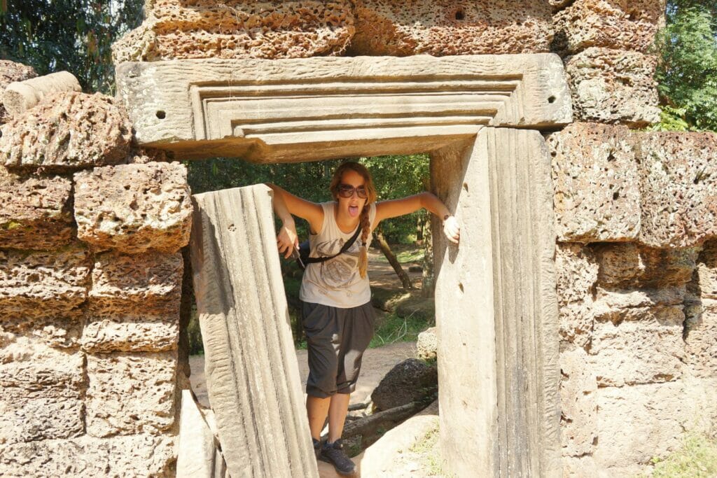 cool off in the shade of an Angkor temple