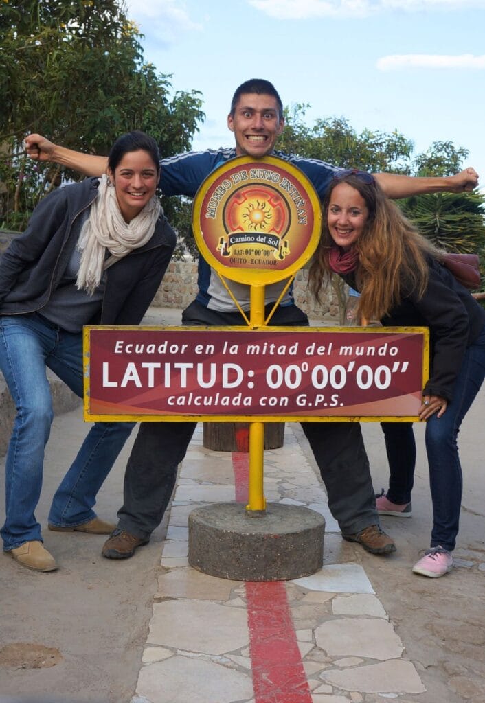 in the middle of the world at the Mitad del Mundo monument in Quito