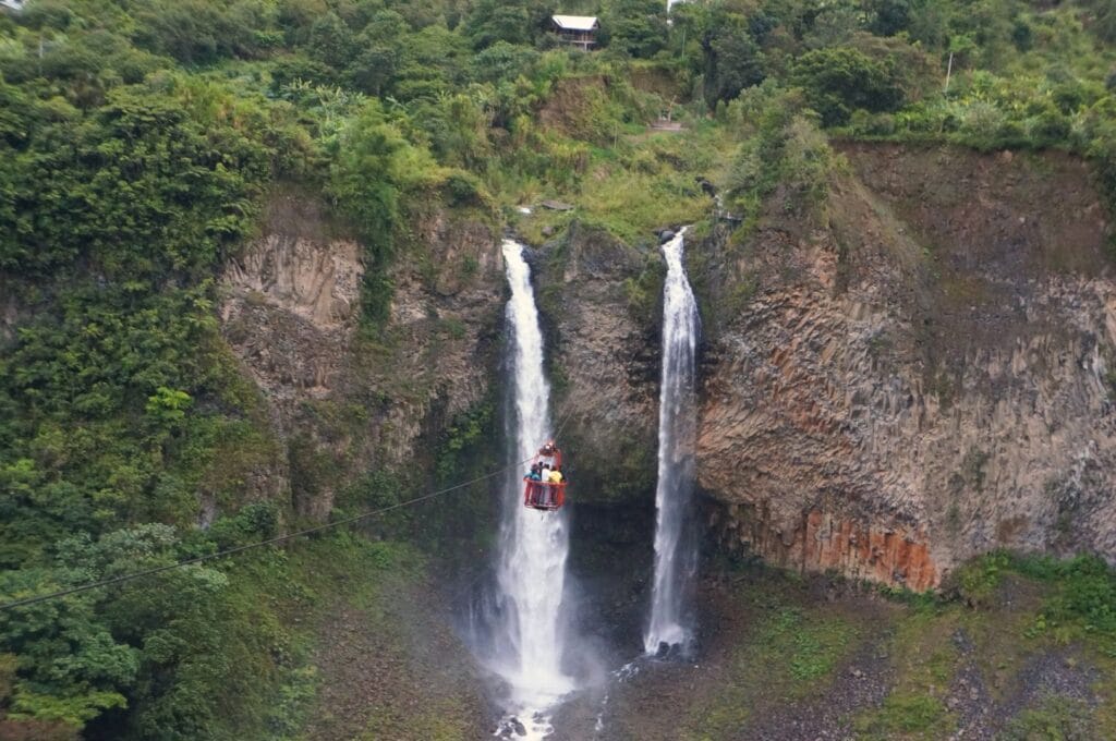 Tarabita in front of the Manto de la Novia waterfall