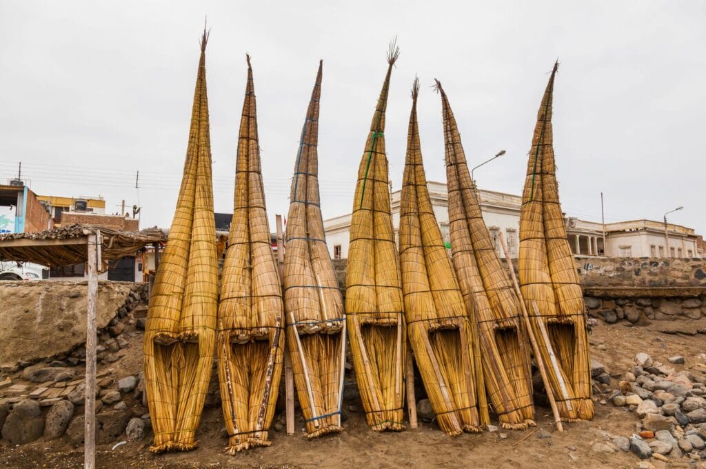 Caballitos de totora on a beach in Peru