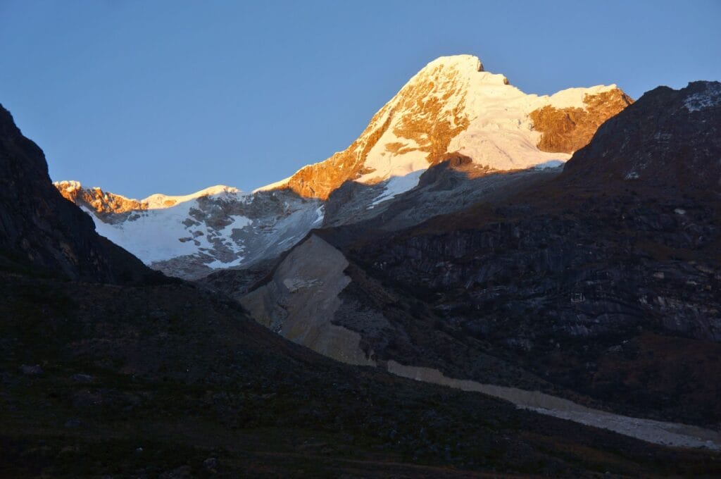 Sunrise over Mount Artesonraju during the Santa Cruz trek