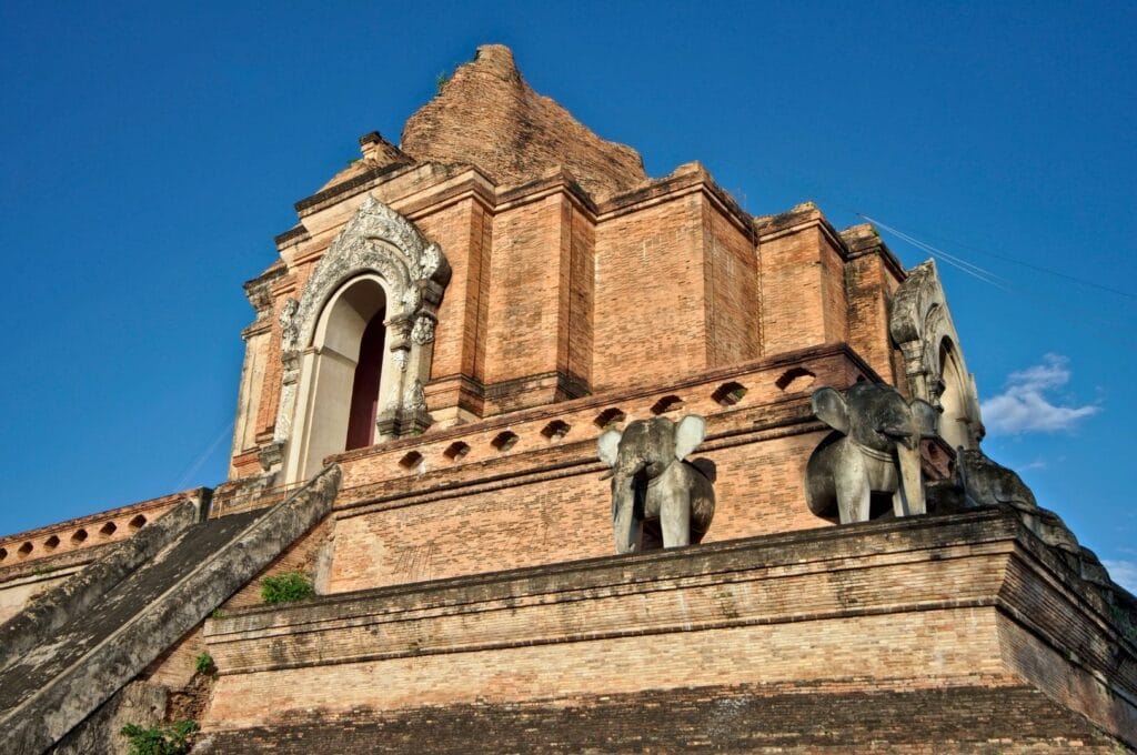 brick façade and elephant statues of Wat Chedi Luang temple