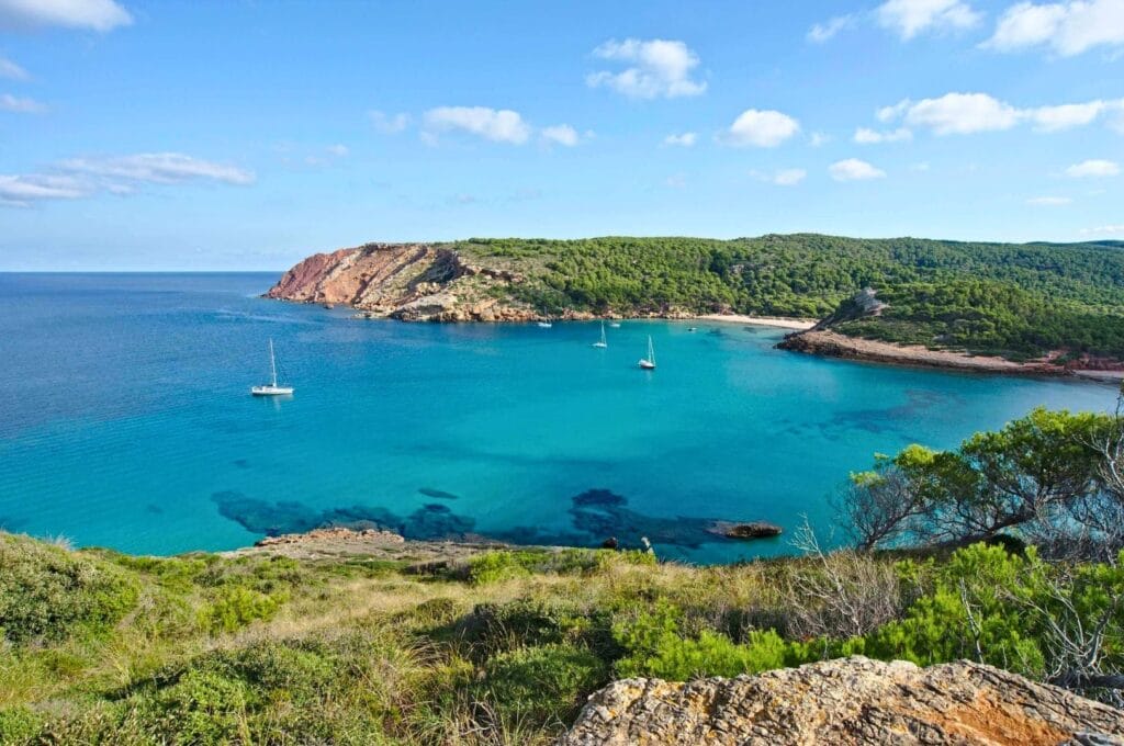 view of Cala de Algaiarens cove and Playa des Bots beach